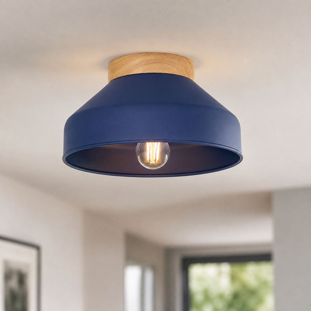 Oslo midnight blue and wood semi-flush ceiling light lit in a living room