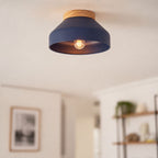 Oslo midnight blue semi-flush ceiling light on a ceiling by a window