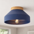 Oslo midnight blue semi-flush ceiling light with wood base and filament bulb, lit