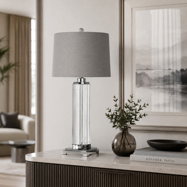 Roma fluted glass table lamp with grey herringbone shade on a ribbed sideboard