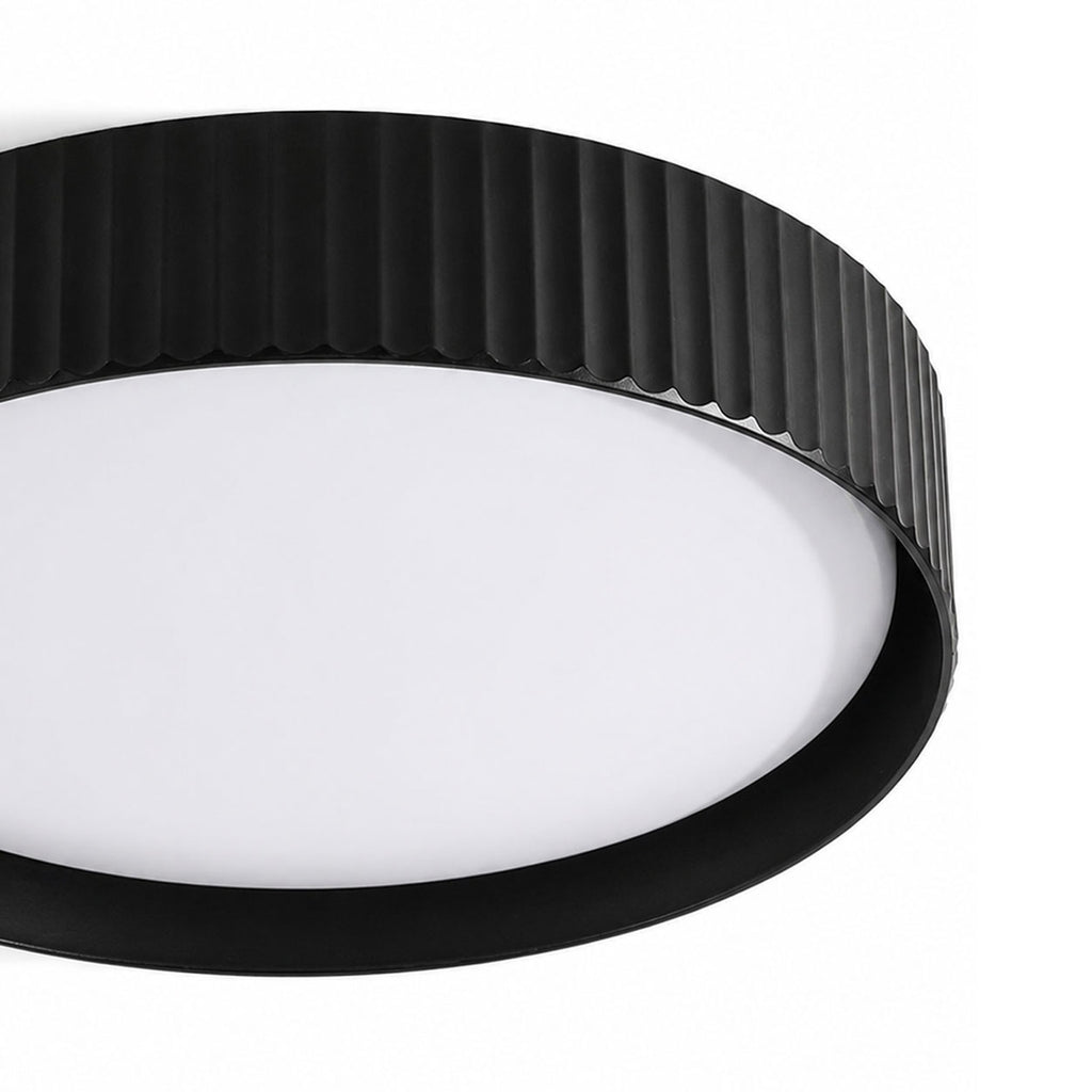 Senna black ribbed dimmable LED flush ceiling light, close-up of the fluted rim