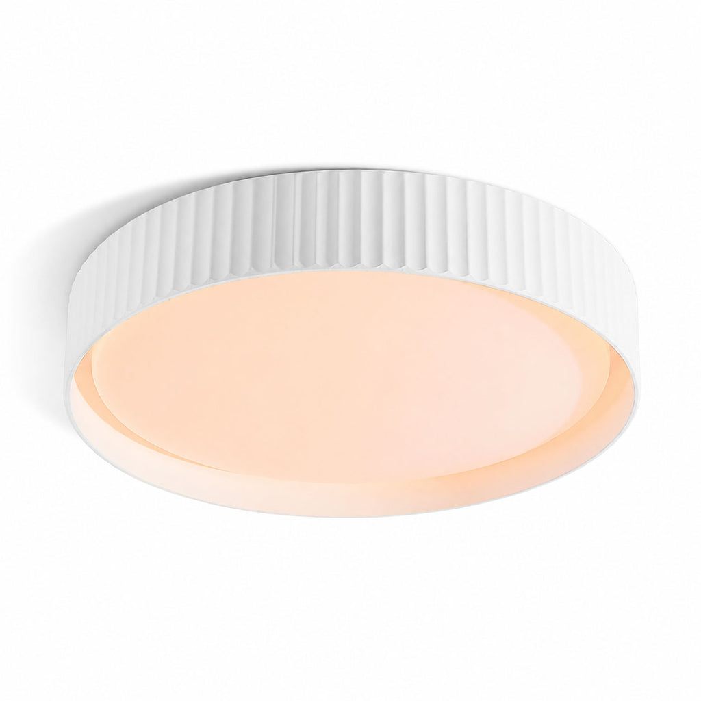 Senna white ribbed LED flush ceiling light, angled view on white