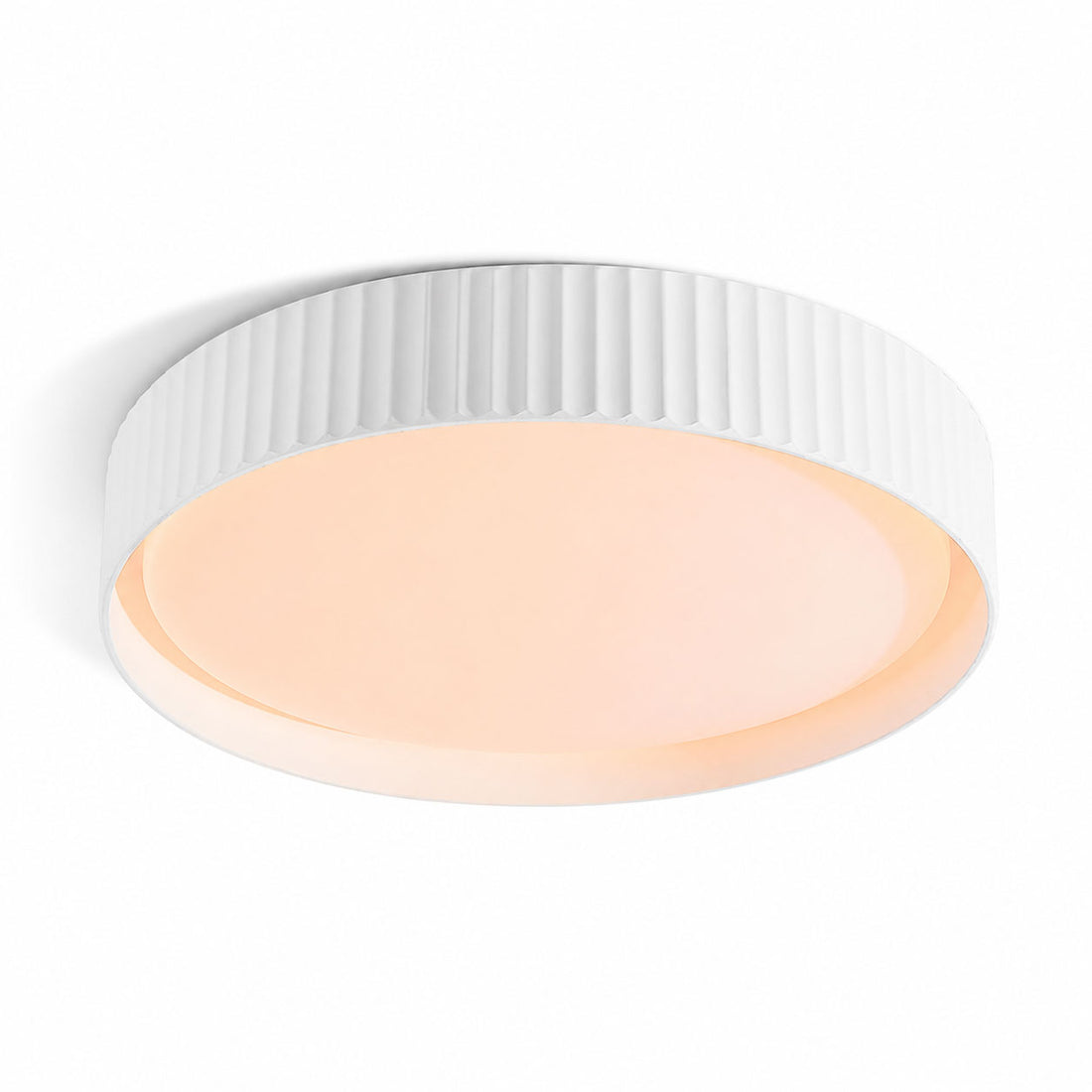 Senna white ribbed LED flush ceiling light, angled view on white