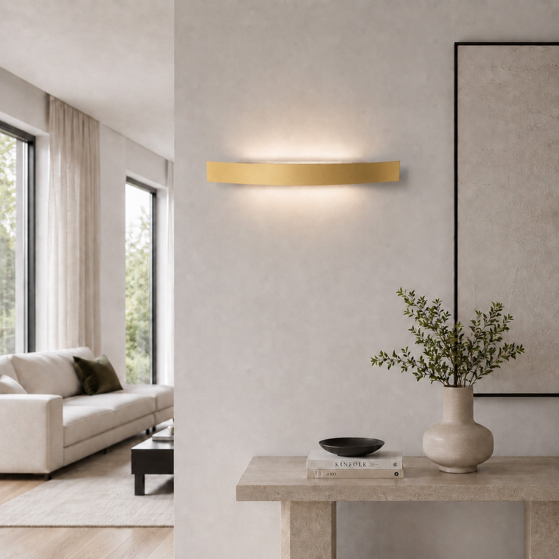 Spoiler satin gold LED washer light lit above a desk in a bright study