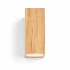 Talia wood-effect up down wall light, front view showing the lower GU10 aperture