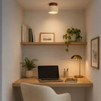 Tavira stone flush ceiling light lit above a home office nook with desk and shelves