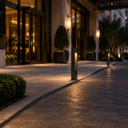 Torino anthracite bollard post lights along a paved hotel forecourt at night