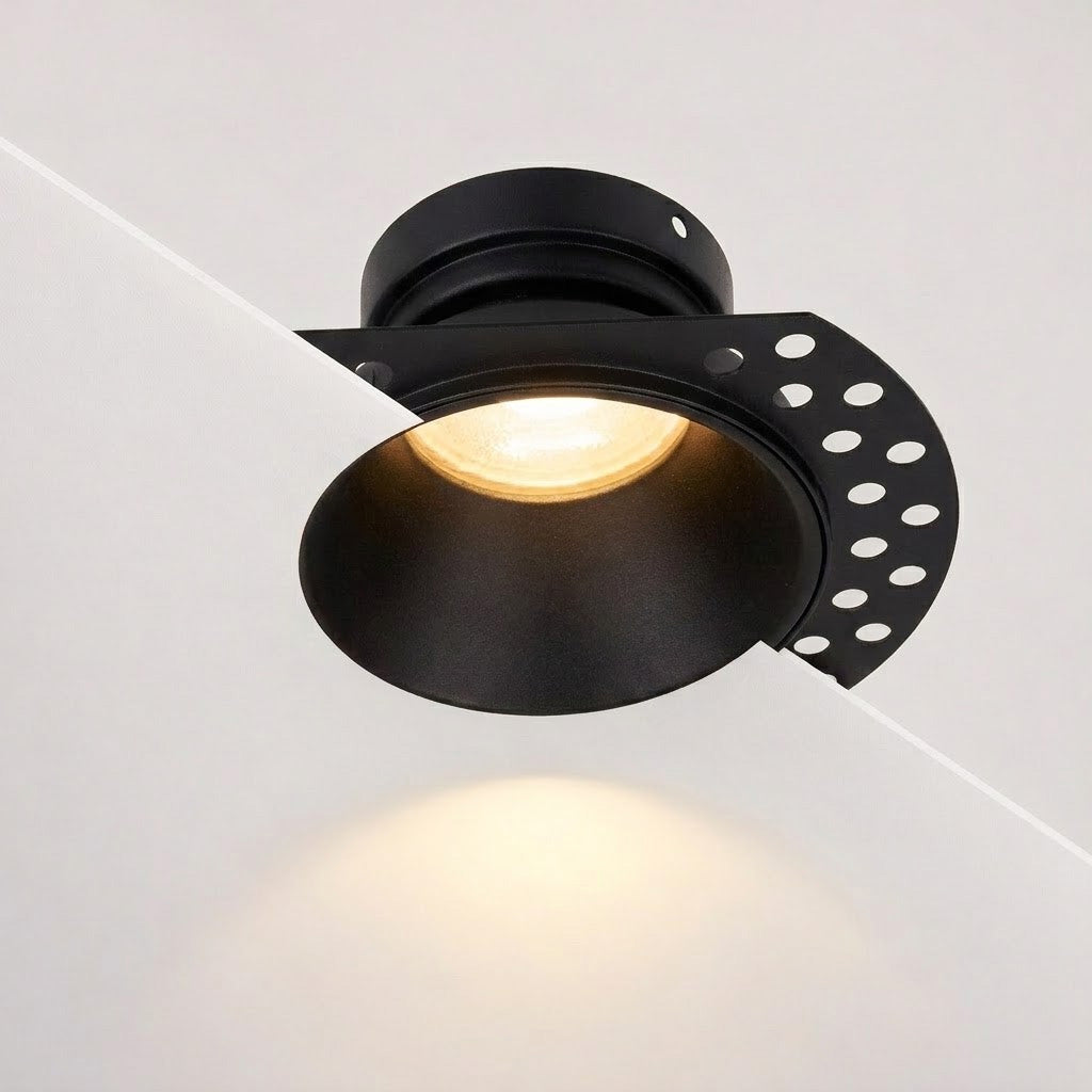Kanto Mini trimless plaster-in downlight in matt black with warm white glow