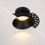 Kanto Mini trimless plaster-in downlight in matt black with warm white glow