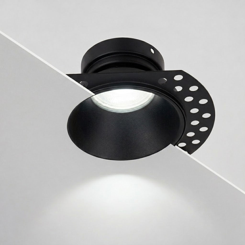 Kanto Mini matt black trimless downlight with plaster-in flange, cool white beam