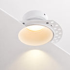 Kanto fixed trimless plaster-in downlight in matt white glowing warm white
