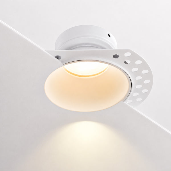 Kanto fixed trimless plaster-in downlight in matt white glowing warm white