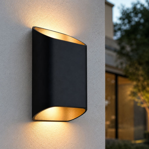 Close-up of the Varna's curved matt black body and brushed gold interior, lit