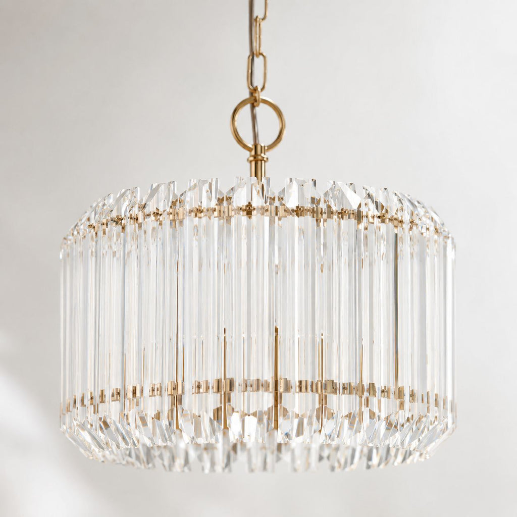 Veyra 3-light gold drum pendant with faceted glass rods, close-up on white