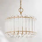 Veyra 3-light gold drum pendant with faceted glass rods, close-up on white