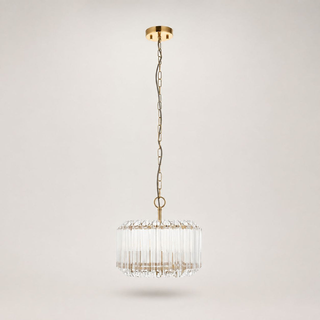 Veyra gold and glass drum pendant on a long chain, full view on white