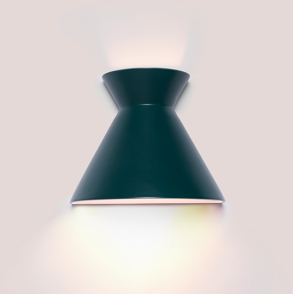 Kiro small midnight green ceramic wall light casting light up and down