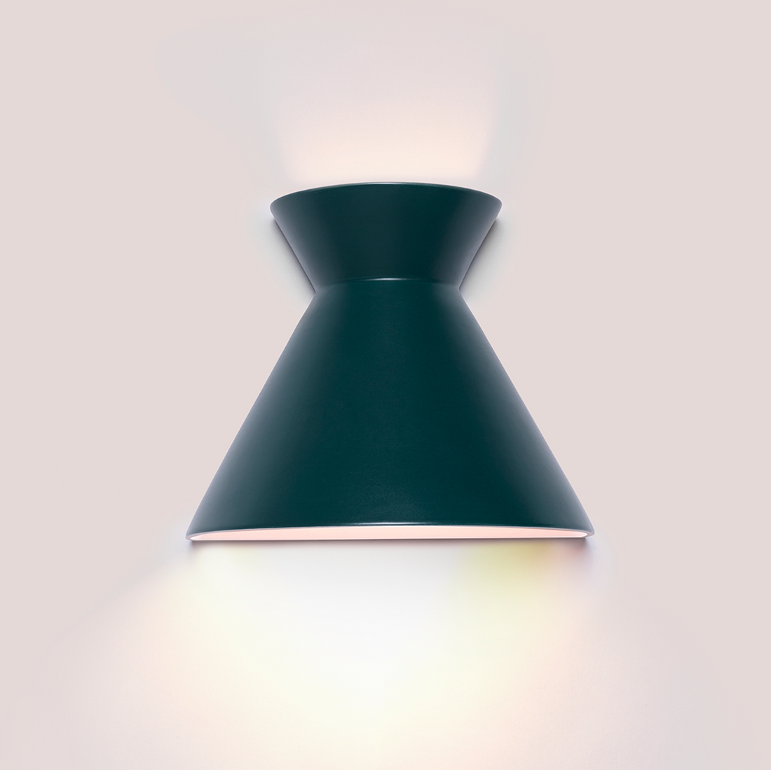 Kiro large midnight green ceramic wall light casting light up and down