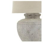 Antique white artisan table lamp showing rustic finish and generous proportions
