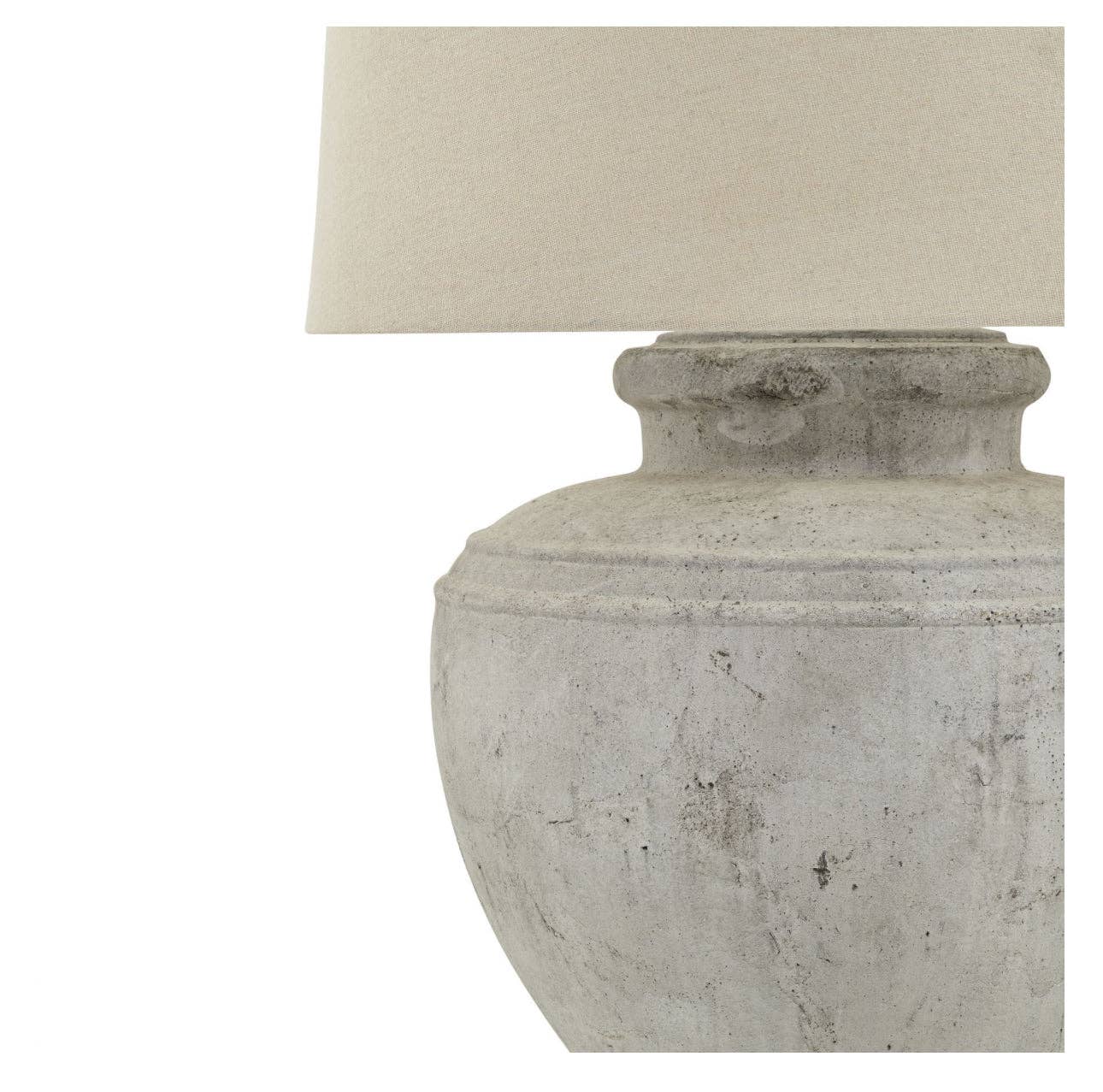 Antique white artisan table lamp showing rustic finish and generous proportions