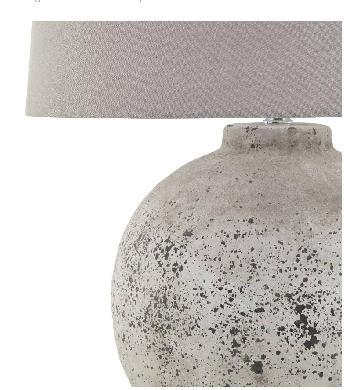 Tiber stone-effect table lamp showing sculptural base detail