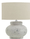 Darcy squat table lamp with antique white finish and linen shade