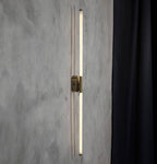 Close-up of Akra linear wall light showing vintage metal texture