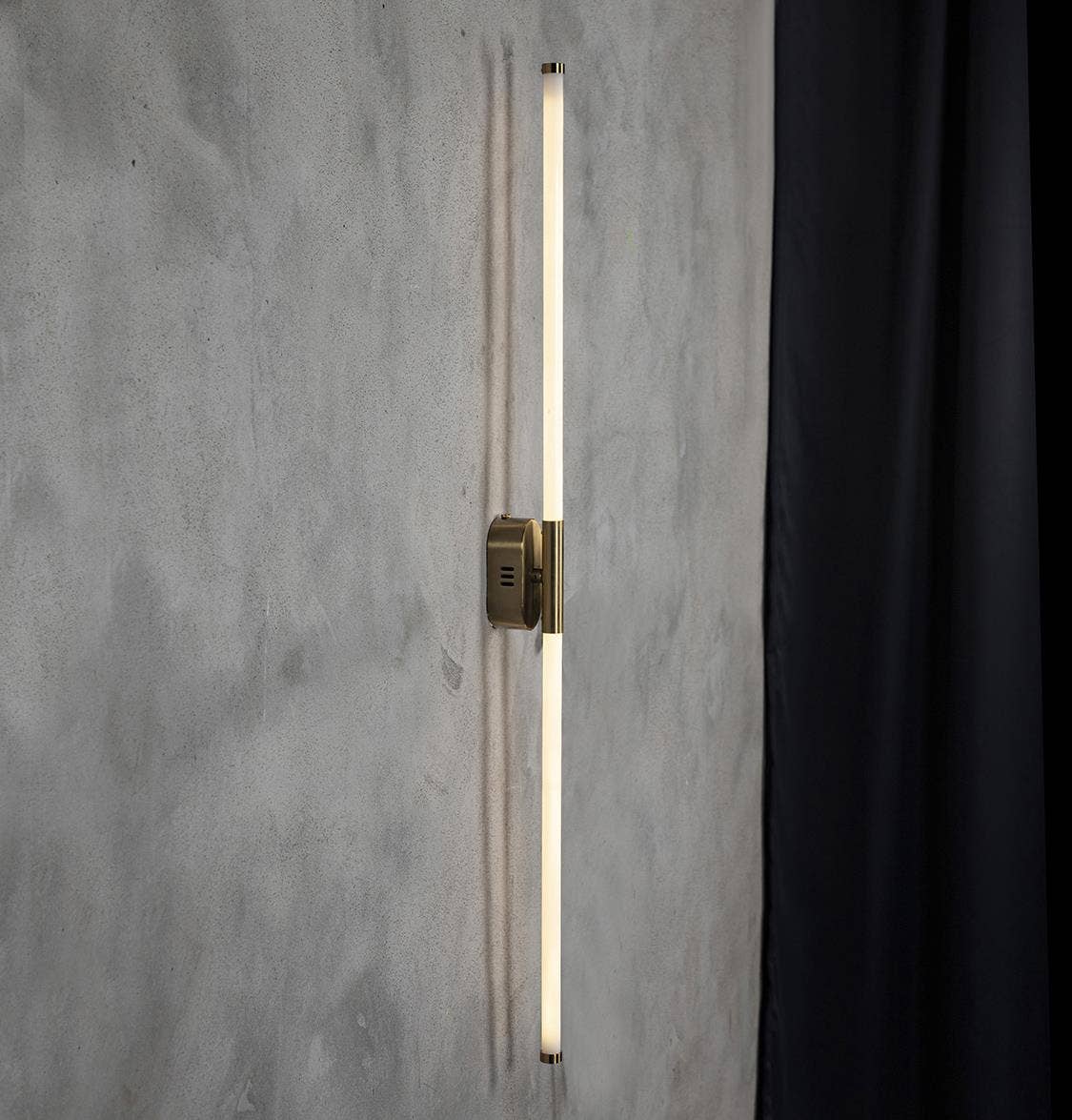 Close-up of Akra linear wall light showing vintage metal texture