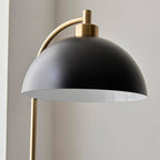 Close-up of Aimee floor lamp adjustable head and gold metal detailing