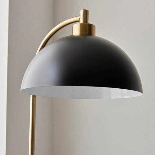 Close-up of Aimee floor lamp adjustable head and gold metal detailing