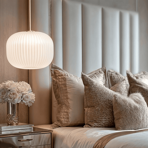 Bellamy white and gold ribbed glass circular pendant ceiling light hanging in modern interior