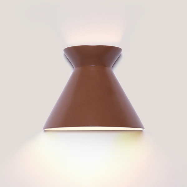 Kiro small russet brown ceramic wall light casting light up and down