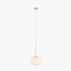 Close up of Bellamy pendant light showing white glass shade with gold ribbed glass detail