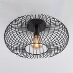 Close-up of Cayo black metal cage light shade showing wire detail