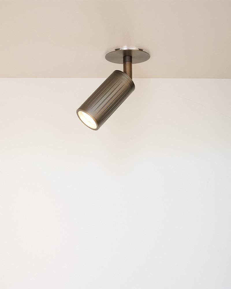 Luminar Box Mount ceiling spotlight in browned brass finish with ribbed cylinder detail
