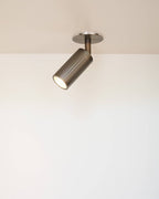 Luminar Box Mount ceiling spotlight in browned brass finish with ribbed cylinder detail