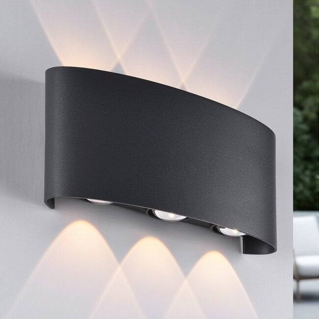 Close up of Kyra LED wall light showing anthracite finish and dual light direction