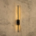 Assos 70cm matt black LED wall light mounted on white wall