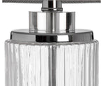 Close-up of Roma lamp's chrome accents and herringbone fabric shade detail