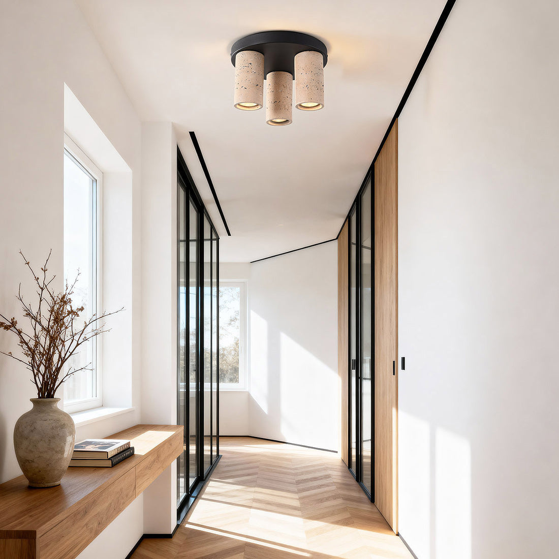 Tavo ceiling spotlight fitting showing directional lighting and sculptural design