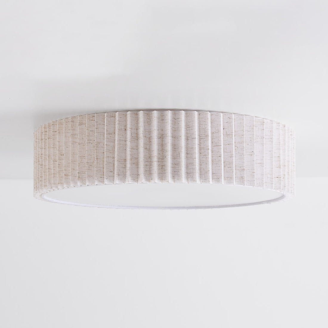 Plisse 40cm pleated ceiling light fitted in modern UK living room interior