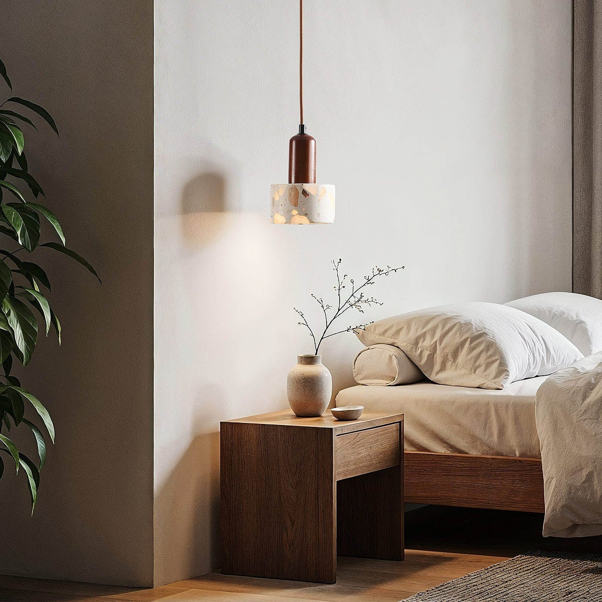 Close up of Koto pendant light showing terrazzo speckle detail and natural wood accent