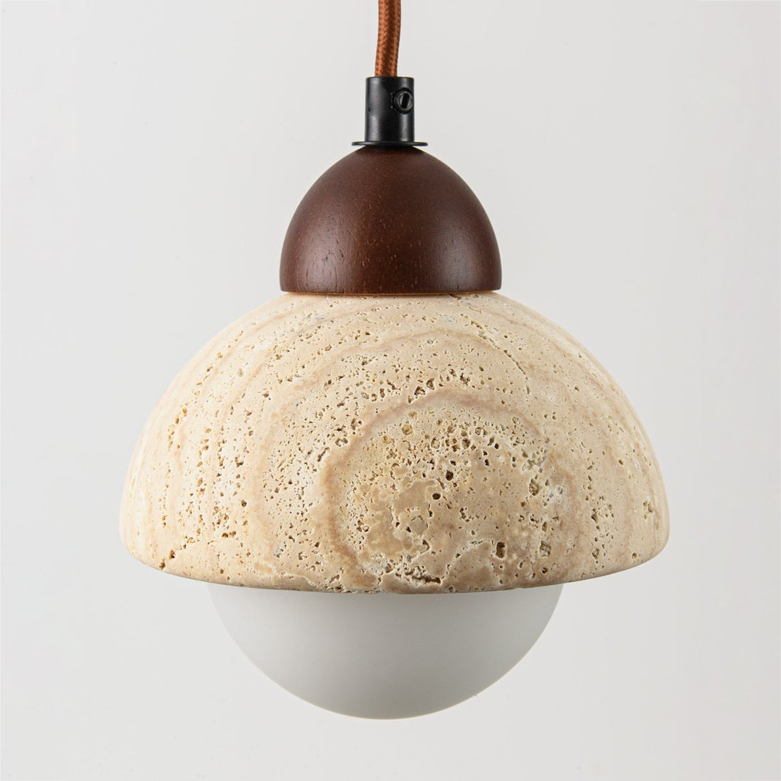 Sabbia round pendant light cluster installed in modern dining room interior