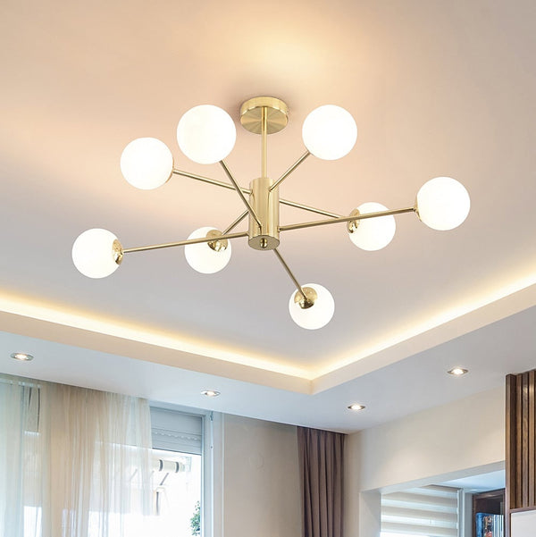 Dorado eight-light ceiling light with gold arms and frosted glass shades