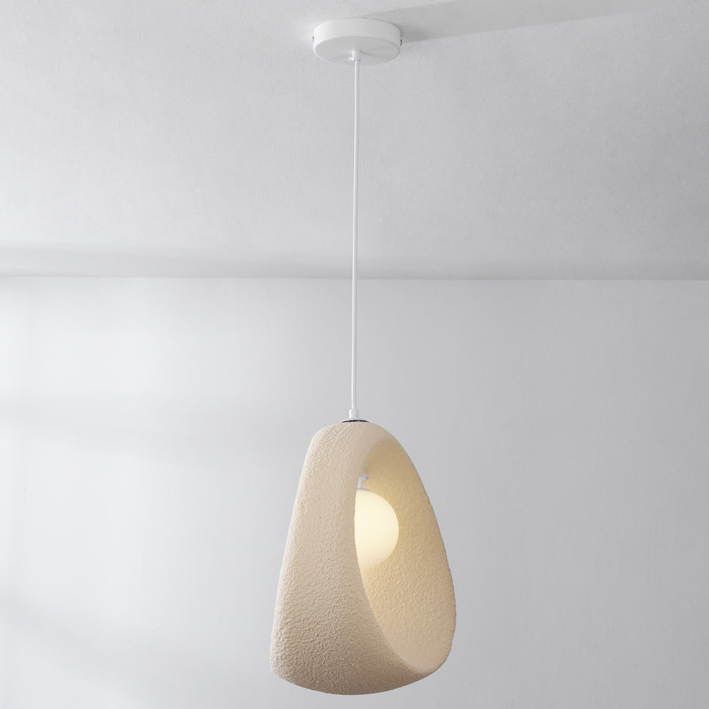 Akari wabi-sabi style pendant light illuminated in dining nook setting