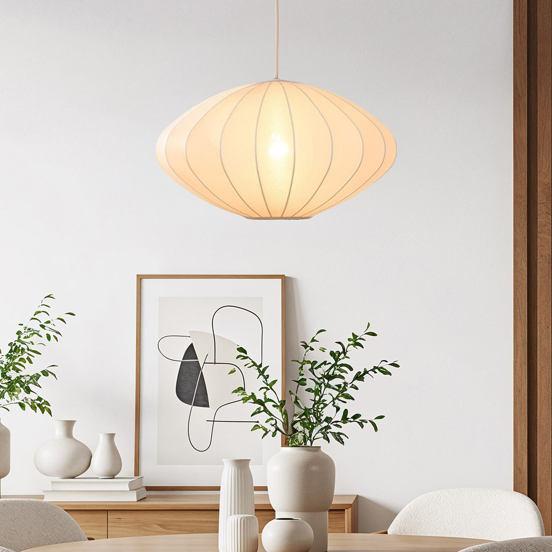 Nell beige fabric drum pendant light 48cm diameter hanging in modern interior