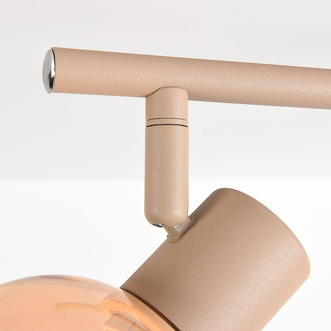Beno three light spotlight bar in beige metal with adjustable amber glass spotlights