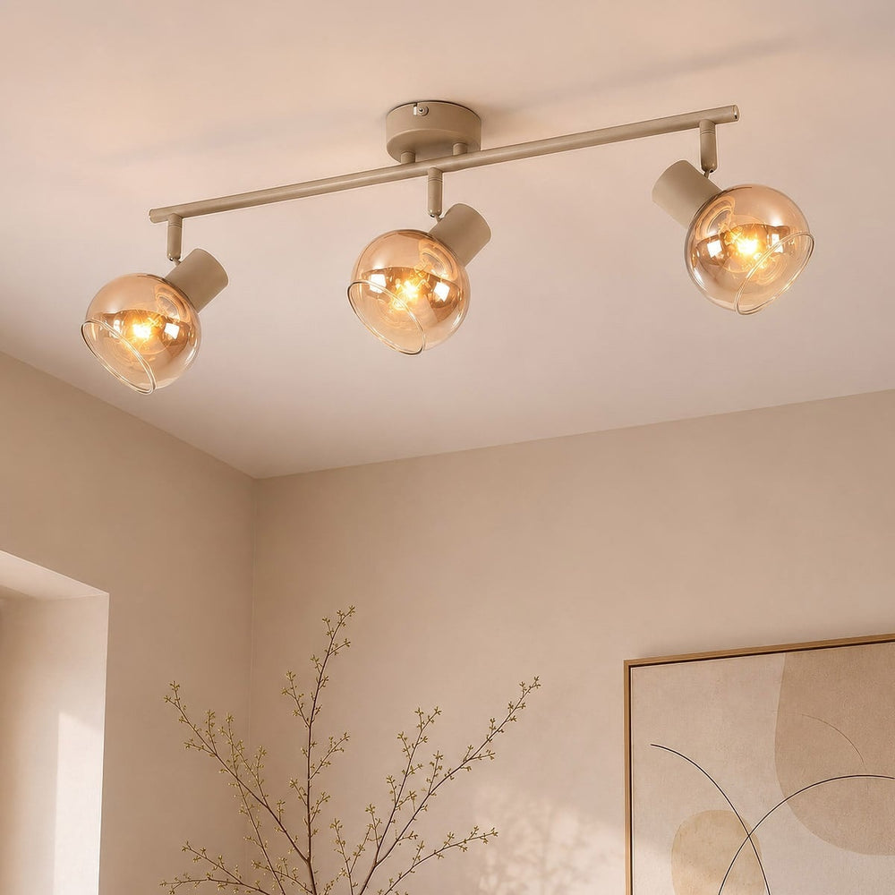 Beno Adjustable Spotlight Bar — Beige & Amber Glass, 3 Lights in a room