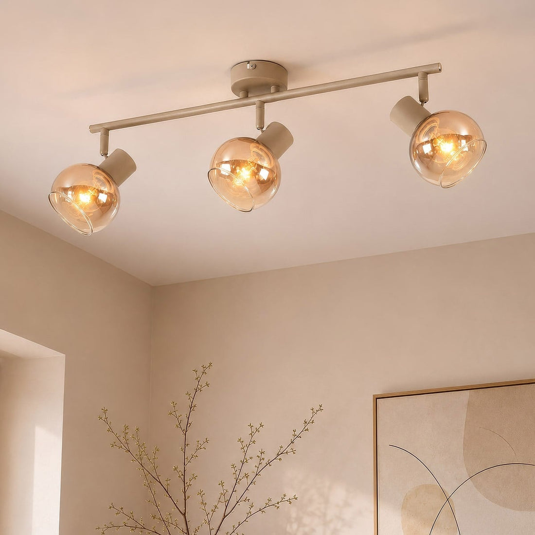 Beno beige adjustable spotlight bar with three amber glass shades for ceiling mounting