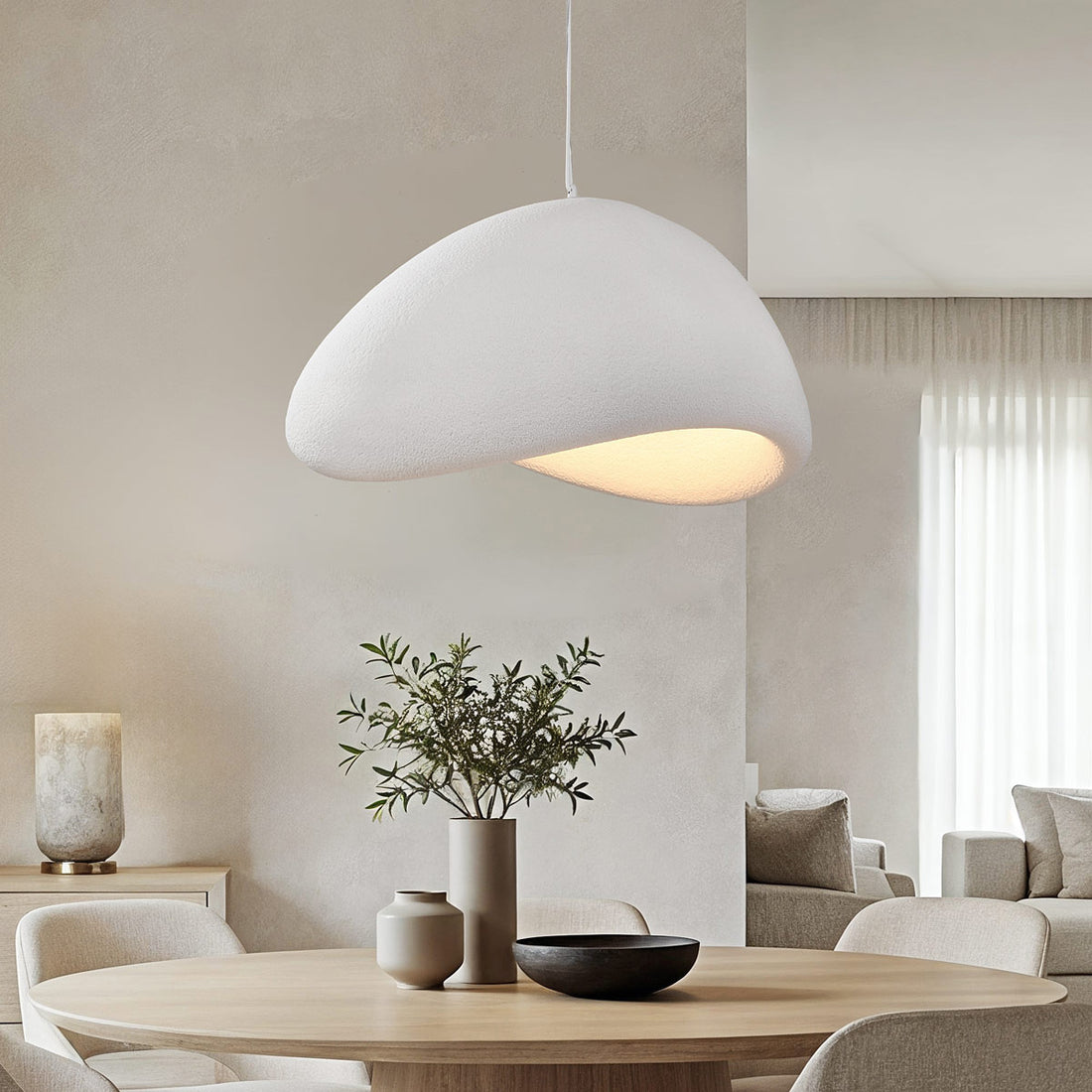Senja cloud white stone-effect pendant light 80cm diameter hanging above dining table